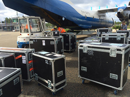 flightcases being loaded onto aeroplane